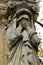 Detail of a mourning sculpture on a Pere Lachaise cemetery in Paris