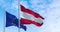 Detail of the national flag of Austria waving in the wind with blurred european union flag in the background on a clear day