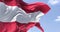 Detail of the national flag of Austria waving in the wind on a clear day