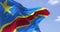 Detail of the national flag of the Democratic Republic of the Congo waving in the wind on a clear day