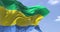 Detail of the national flag of Gabon waving in the wind on a clear day