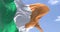 Detail of the national flag of Ireland waving in the wind on a clear day