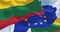 Detail of the national flag of Lithuania waving in the wind with blurred european union flag in the background