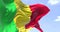 Detail of the national flag of Mali waving in the wind on a clear day