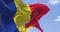 Detail of the national flag of Romania waving in the wind on a clear day