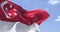 Detail of the national flag of Singapore waving in the wind on a clear day