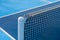 Detail of a new tennis net on a pickleball court