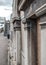 Detail of an old and abanonded Train Station showing detail of its architecture next to a railway platform.