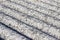 Detail of an old aged dangerous roof made of corrugated asbestos panels - one of the most dangerous materials in buildings and