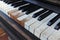 Detail of old, broken and dusty piano keyboard