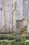 Detail of an old half-timbered house with dirty walls and weathered wood,damaged, bottom wall , abstact photo France