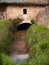 Detail of an old water mill on a river.