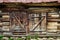 Detail of old wooden textured and weathered barn door