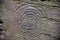 Detail of one of a pair of ancient petroglyphs in a valley in Cornwall