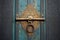 detail of ornate brass door handle