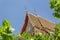 Detail of ornately decorated temple roof in thailand