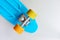 Detail of penny board on grey background