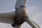 Detail propeller wind turbines with a background of sky.