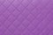 Detail of purple sewn leather, pink leather upholstery background pattern