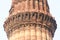 Detail of Qutub Minar minaret in Delhi, Indi