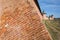 Detail of red bricks wall and towers of Saint Euthymius monastery in Suzdal, Russian heritage architecture