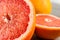 Detail of red grapefruit cut in half.