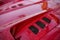 Detail of red super-sport car vents on a bonnet