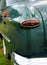 Detail of a red tail light on a 1950`s automobile