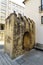 Detail of the remains of a medieval stone gate located next to the facade of the National Museum called de Machado Castro in Coimb