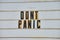 Detail of road sign all white with black capital letters DONT PANIC from Hitchhikers Guide to the Galaxy