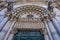 Detail on romanesque Facade of St. Martin Cathedral at Piazza Antelminelli in Lucca, Tuscany