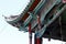 Detail of the roof decorations of a building in the village of Shigu, Yunnan, China