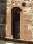 Detail of the ruins of a Gothic monastery, stone masonry with a typical Gothic window