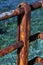 Detail of rusty railings by the sea