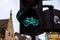 Detail shot with a bicycle traffic light switched to green colour