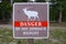 Detail shot of Danger do not approach wildlife sign in the Yellowstone National Park, Wyoming, USA. Safety in the wild