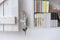 Detail of small bookcase with books in the wall with decoration