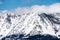 Detail of the snow covered Sierra mountains as seen from the shoreline of south Lake Tahoe, California