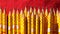 Detail of some Yellow pencils with red background
