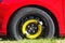 Detail of Space Saver Spare Tyre on Red Car