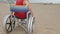 Detail of a special wheelchair with big wheels to move on the sa