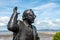 Detail of Statue of Eric Morecambe with Blue sky in Background