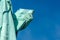 Detail of Statue of Liberty against blue sky, book with the date of USA`s independence. New York City , United States