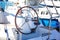 Detail of steering wheel and navigation instruments of a sailboat. blur depth of field