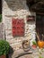 Detail of stone facade with horseshoes.