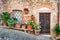 Detail of stone houses in an alley of an ancient Tuscan village