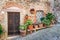 Detail of stone houses in an alley of an ancient Tuscan village
