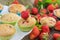 Detail on a Strawberry and Mint Muffins on a White Plate with sm