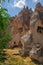 A detail from the structure of Cappadocia. Impressive fairy chimneys of sandstone in the canyon near Cavusin village, Cappadocia.