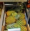 The detail from the supermarket inside with exposed ananas